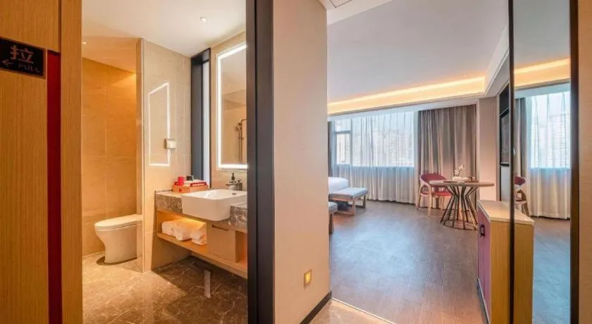 Bed in Echeng Hotel Hezhou Shizheng Square