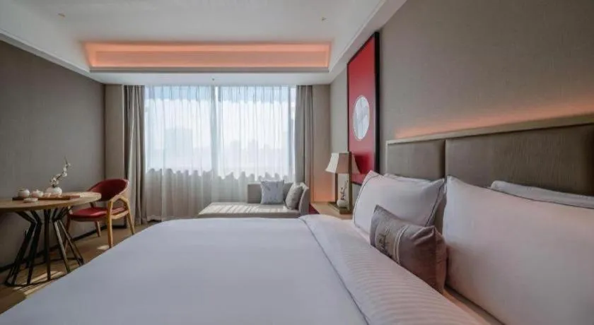 Bed in Echeng Hotel Hezhou Shizheng Square