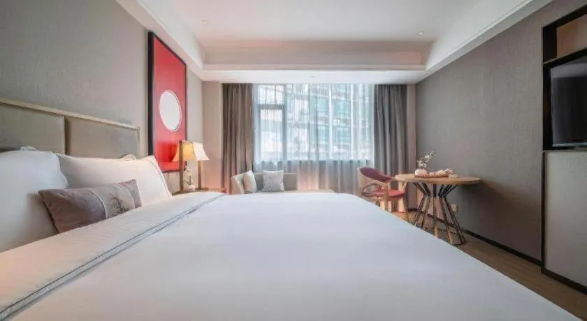 Bed in Echeng Hotel Hezhou Shizheng Square