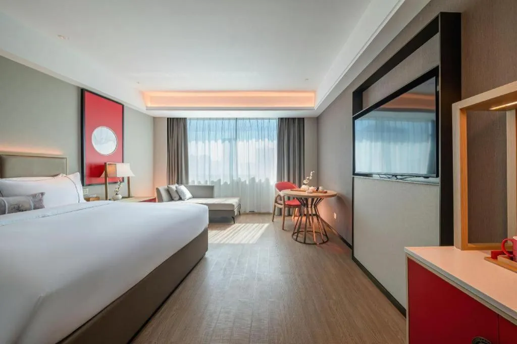 Bed in Echeng Hotel Hezhou Shizheng Square