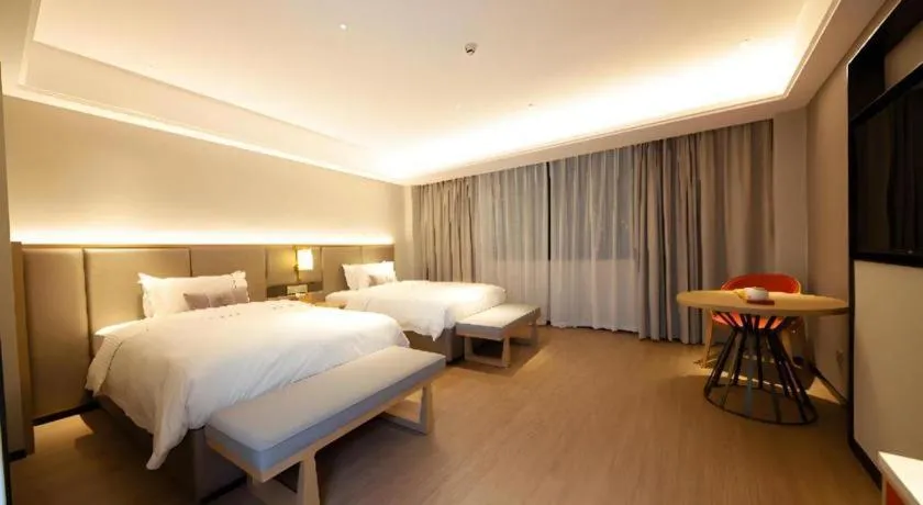 Bed in Echeng Hotel Hezhou Shizheng Square