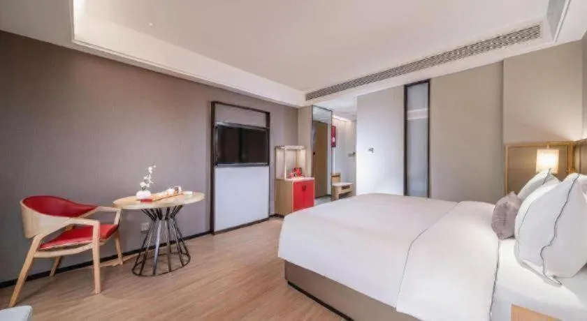 Bed in Echeng Hotel Hezhou Shizheng Square