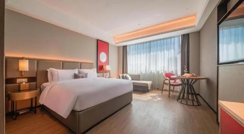 Bed in Echeng Hotel Hezhou Shizheng Square