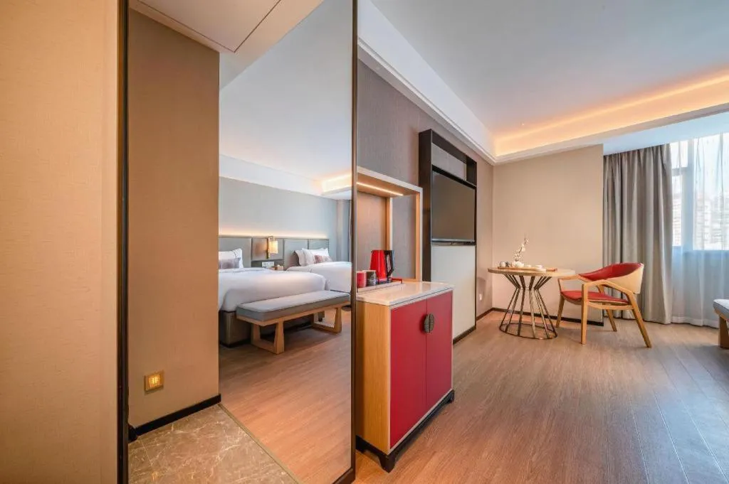 Bed in Echeng Hotel Hezhou Shizheng Square