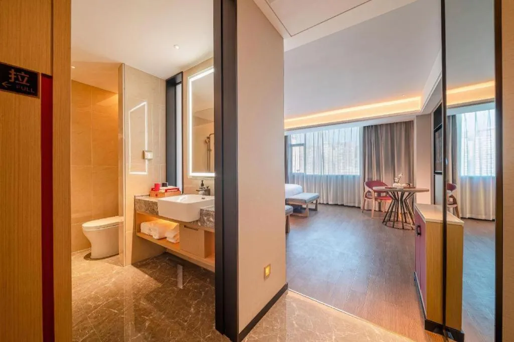 Bed in Echeng Hotel Hezhou Shizheng Square