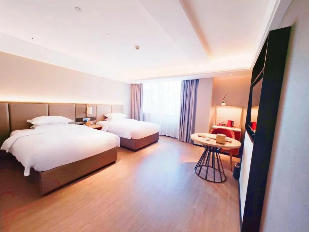 Bed in Echeng Hotel Hezhou Shizheng Square