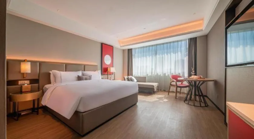 Bed in Echeng Hotel Hezhou Shizheng Square