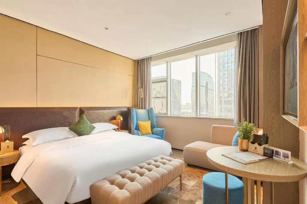 Bed in Echarm Plus Hotel Hangzhou Binjiang Xingguang Avenue