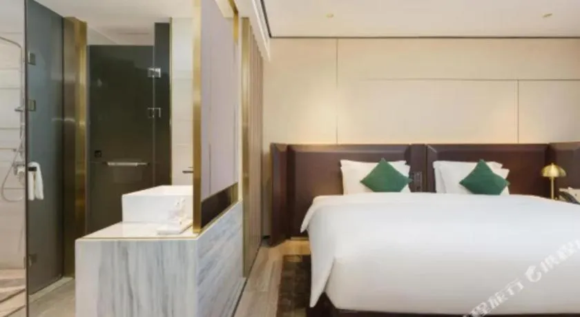 Bed in Echarm Plus Hotel Hangzhou Binjiang Xingguang Avenue