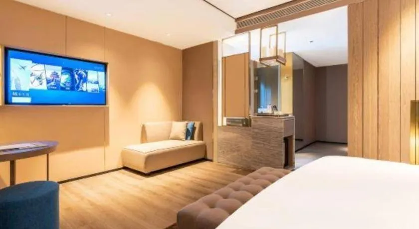 Bed in Echarm Plus Hotel Hangzhou Binjiang Xingguang Avenue
