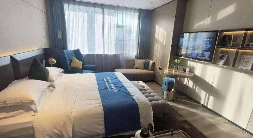 Bed in Echarm Plus Hotel Hangzhou Binjiang Xingguang Avenue