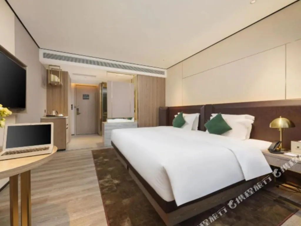 Bed in Echarm Plus Hotel Hangzhou Binjiang Xingguang Avenue