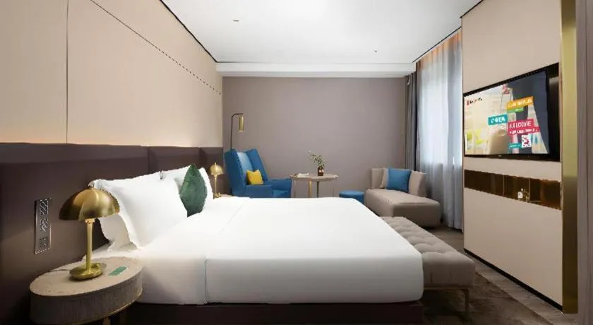 Bed in Echarm Plus Hotel Hangzhou Binjiang Xingguang Avenue