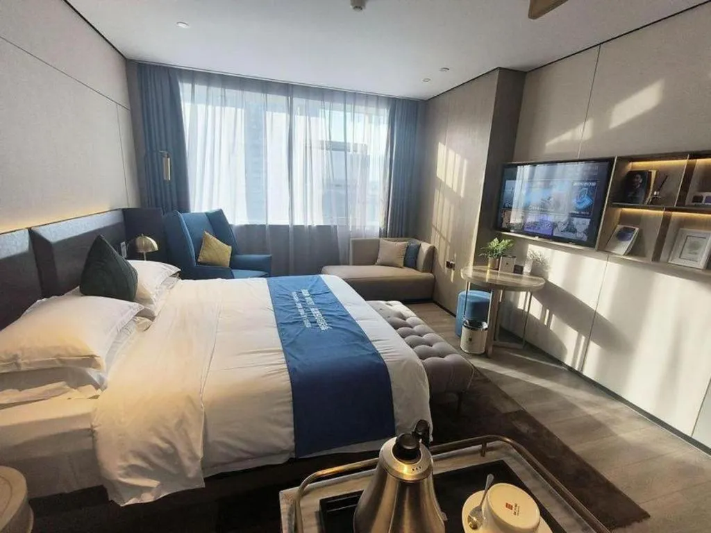 Bed in Echarm Plus Hotel Hangzhou Binjiang Xingguang Avenue