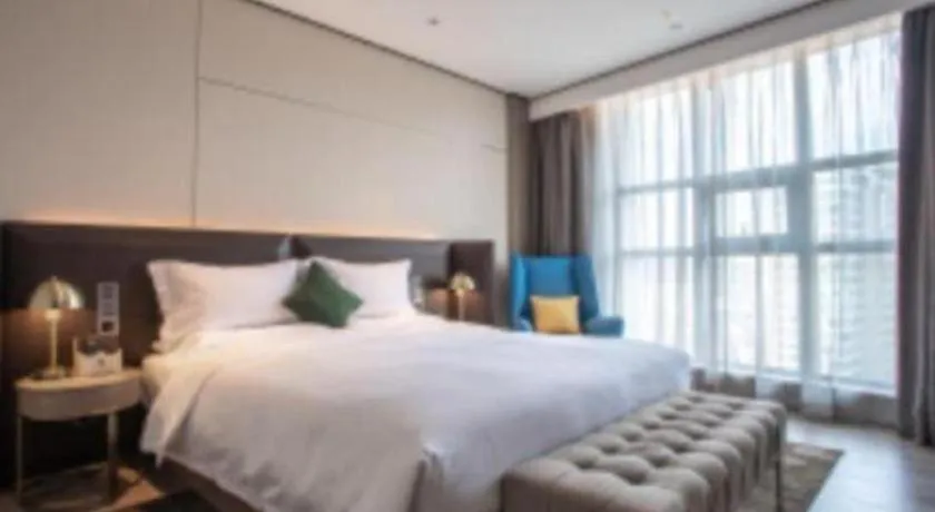 Bed in Echarm Plus Hotel Hangzhou Binjiang Xingguang Avenue