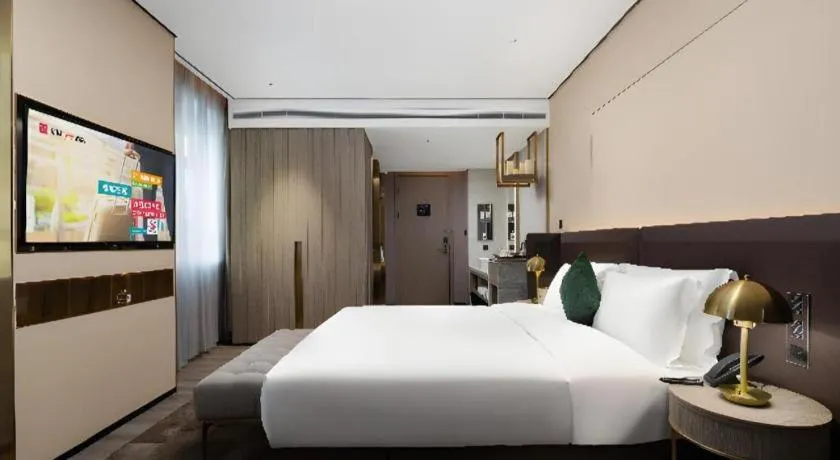 Bed in Echarm Plus Hotel Hangzhou Binjiang Xingguang Avenue