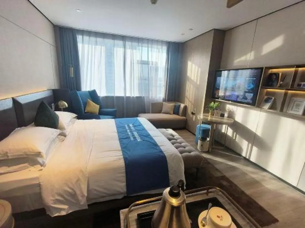Bed in Echarm Plus Hotel Hangzhou Binjiang Xingguang Avenue