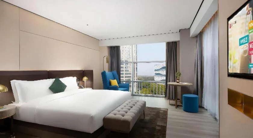 Bed in Echarm Plus Hotel Hangzhou Binjiang Xingguang Avenue