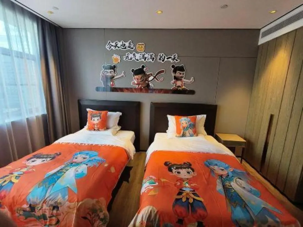 Bed in Echarm Plus Hotel Hangzhou Binjiang Xingguang Avenue