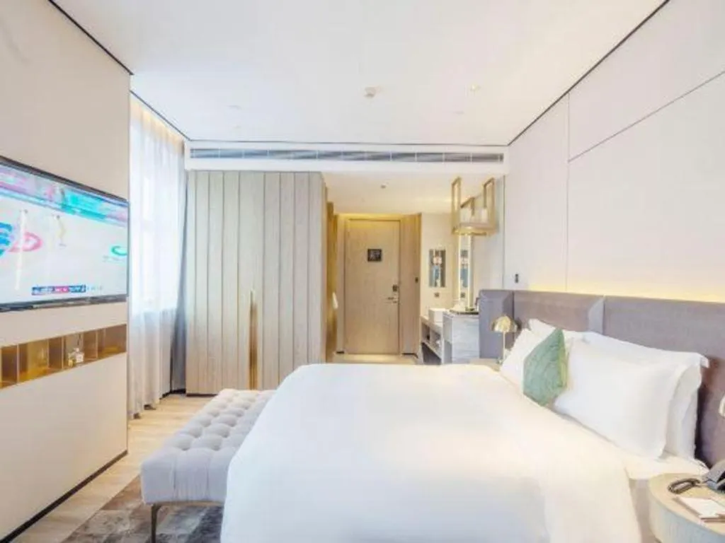 Bed in Echarm Plus Hotel Hangzhou Binjiang Xingguang Avenue