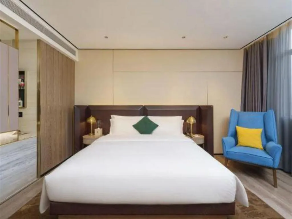 Bed in Echarm Plus Hotel Hangzhou Binjiang Xingguang Avenue