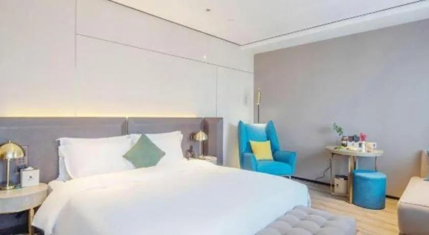 Bed in Echarm Plus Hotel Hangzhou Binjiang Xingguang Avenue
