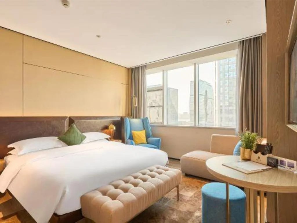Bed in Echarm Plus Hotel Hangzhou Binjiang Xingguang Avenue
