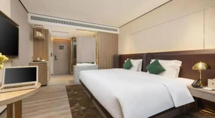 Bed in Echarm Plus Hotel Hangzhou Binjiang Xingguang Avenue