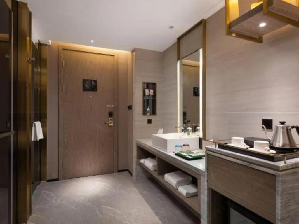 Bed in Echarm Plus Hotel Hangzhou Binjiang Xingguang Avenue