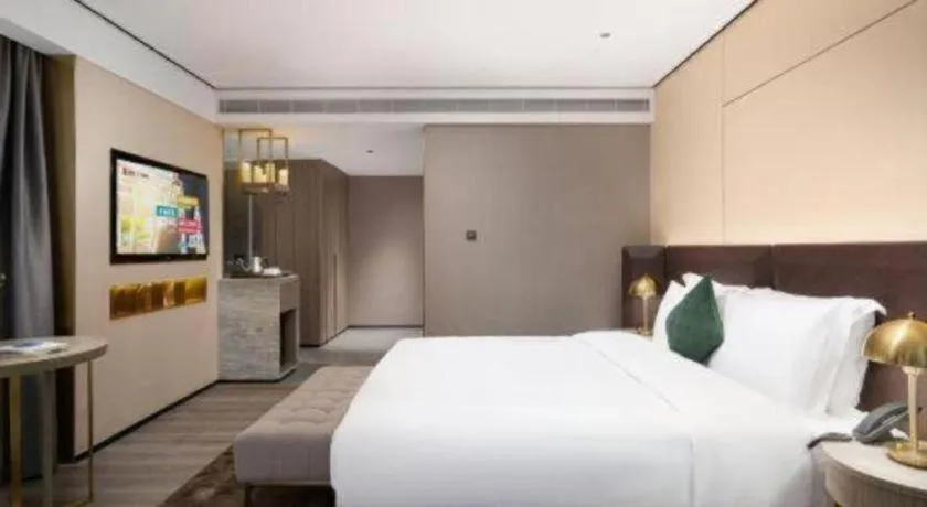 Bed in Echarm Plus Hotel Hangzhou Binjiang Xingguang Avenue