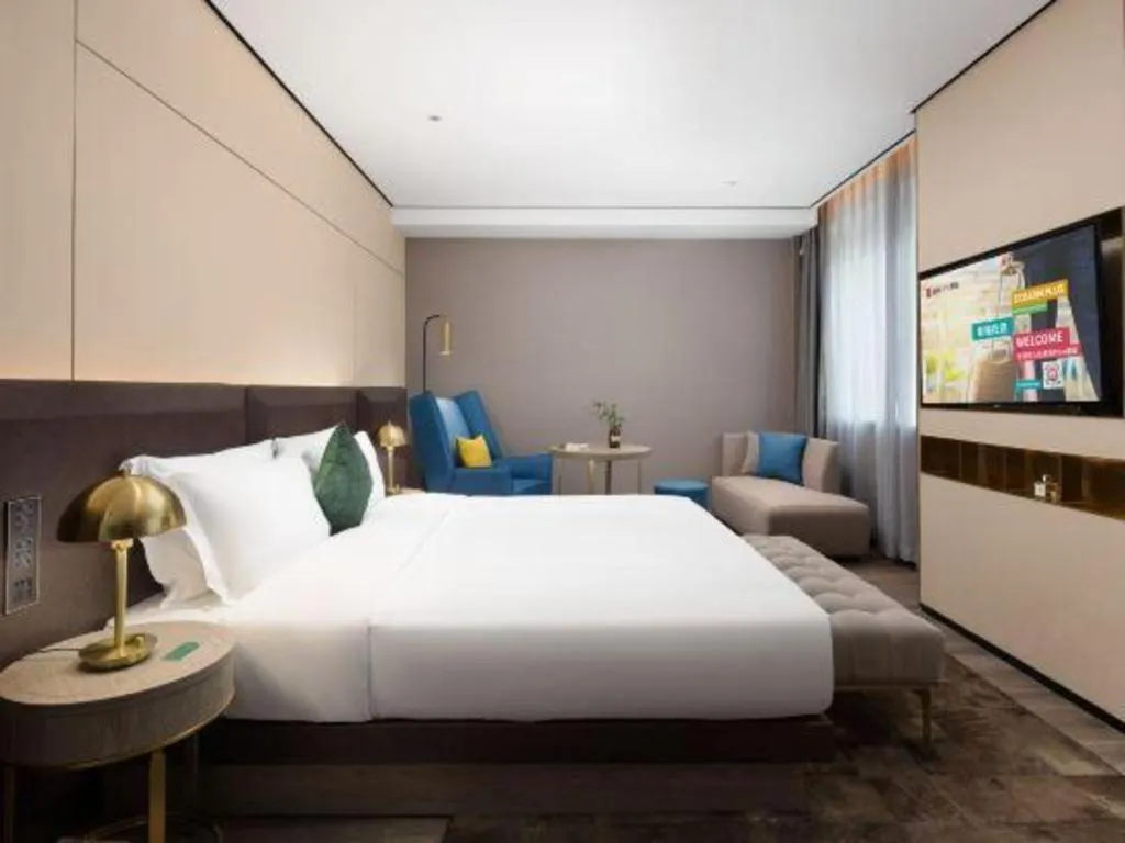 Bed in Echarm Plus Hotel Hangzhou Binjiang Xingguang Avenue