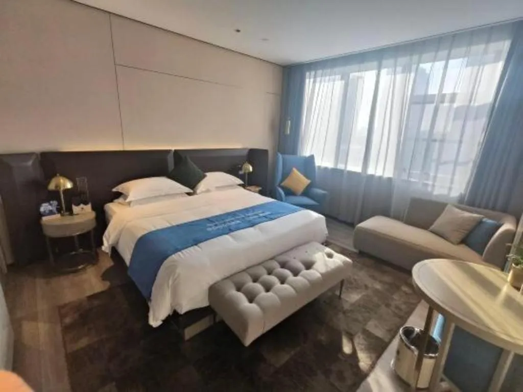 Bed in Echarm Plus Hotel Hangzhou Binjiang Xingguang Avenue