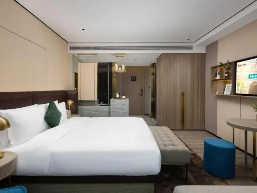 Bed in Echarm Plus Hotel Hangzhou Binjiang Xingguang Avenue