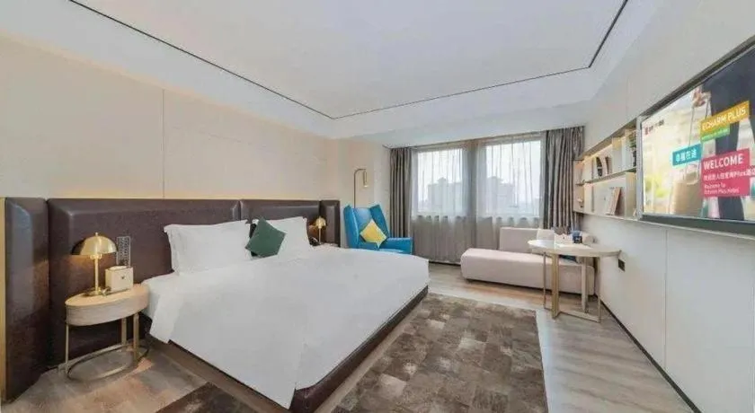 Bed in Echarm Plus Hotel Hangzhou Binjiang Xingguang Avenue