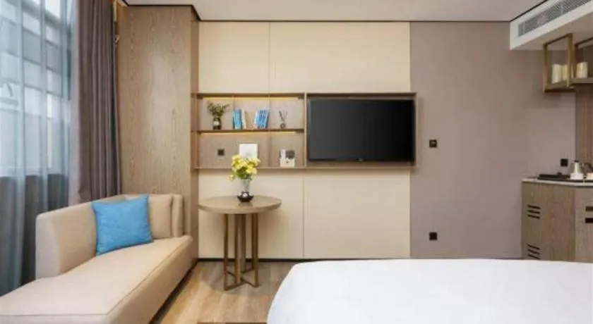 Bed in Echarm Plus Hotel Hangzhou Binjiang Xingguang Avenue