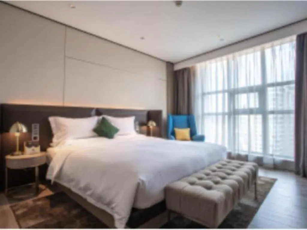 Bed in Echarm Plus Hotel Hangzhou Binjiang Xingguang Avenue