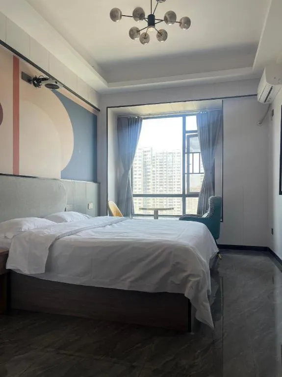 Bed in Echarm Hotel Changsha South High-Speed Railway Station Wuyue Plaza
