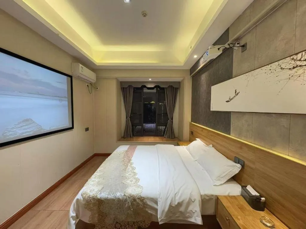 Bed in Echarm Hotel Changsha South High-Speed Railway Station Wuyue Plaza