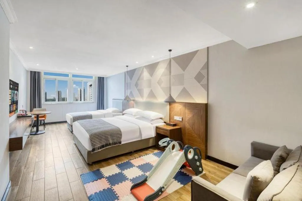 Bed in Borrman Hotel Chongqing Hechuan High-speed Railway Station District Government