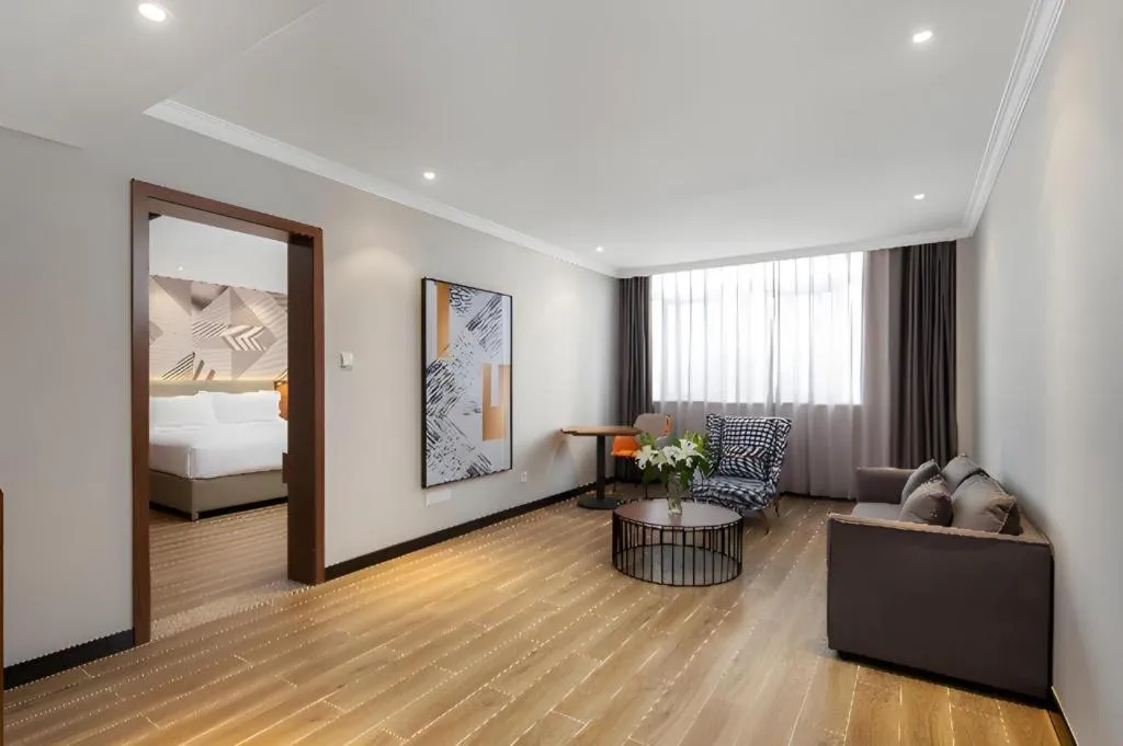 Bed in Borrman Hotel Chongqing Hechuan High-speed Railway Station District Government