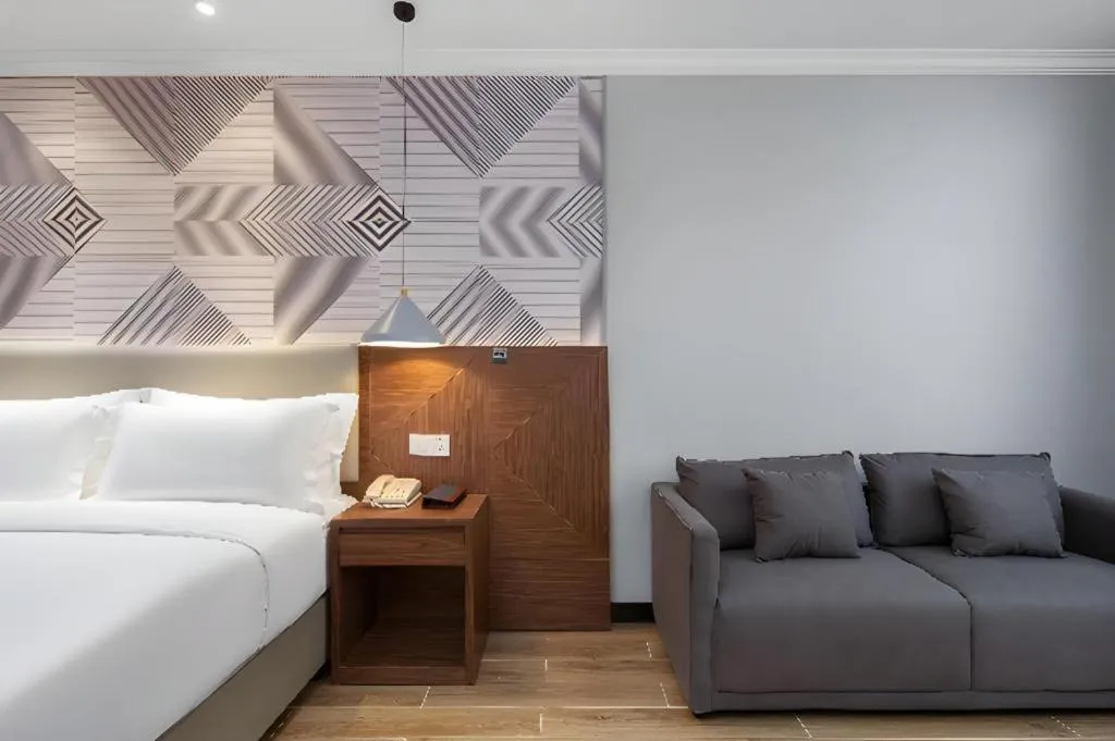 Bed in Borrman Hotel Chongqing Hechuan High-speed Railway Station District Government