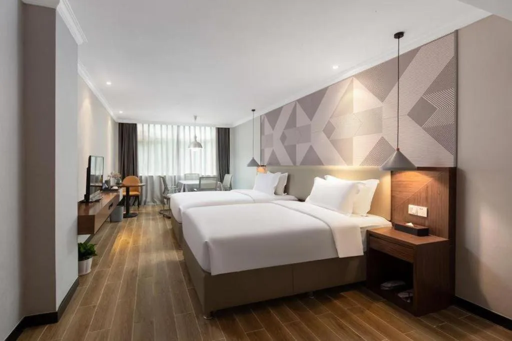 Bed in Borrman Hotel Chongqing Hechuan High-speed Railway Station District Government