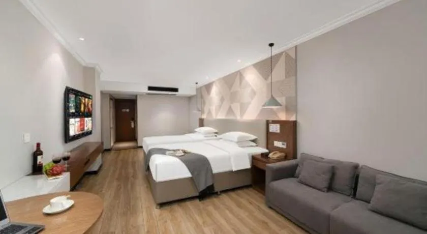 Bed in Borrman Hotel Chongqing Hechuan High-speed Railway Station District Government