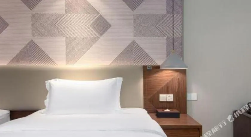 Bed in Borrman Hotel Chongqing Hechuan High-speed Railway Station District Government