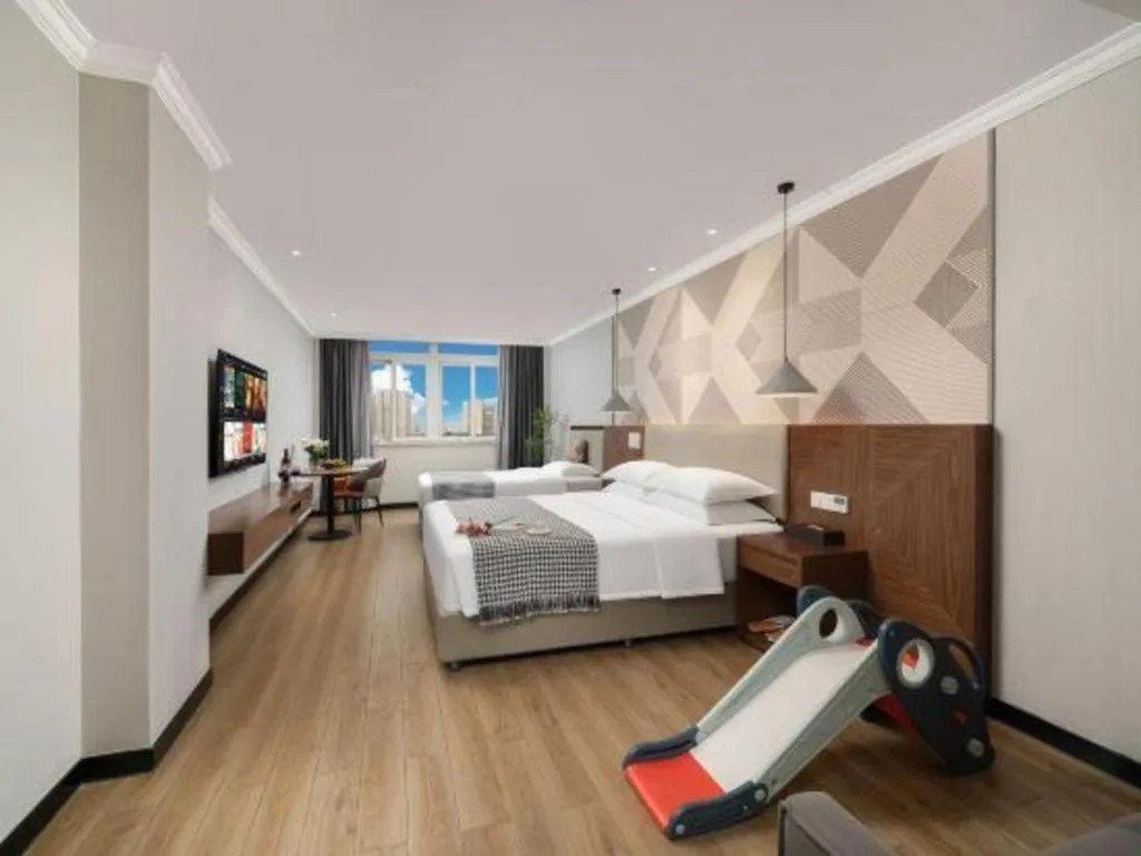 Bed in Borrman Hotel Chongqing Hechuan High-speed Railway Station District Government