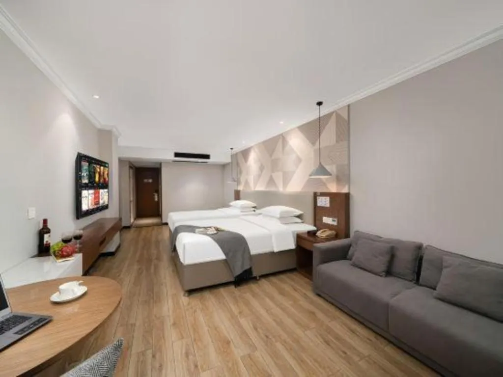 Bed in Borrman Hotel Chongqing Hechuan High-speed Railway Station District Government