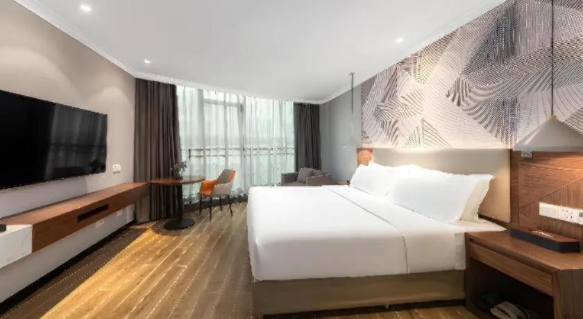Bed in Borrman Hotel Chongqing Hechuan High-speed Railway Station District Government