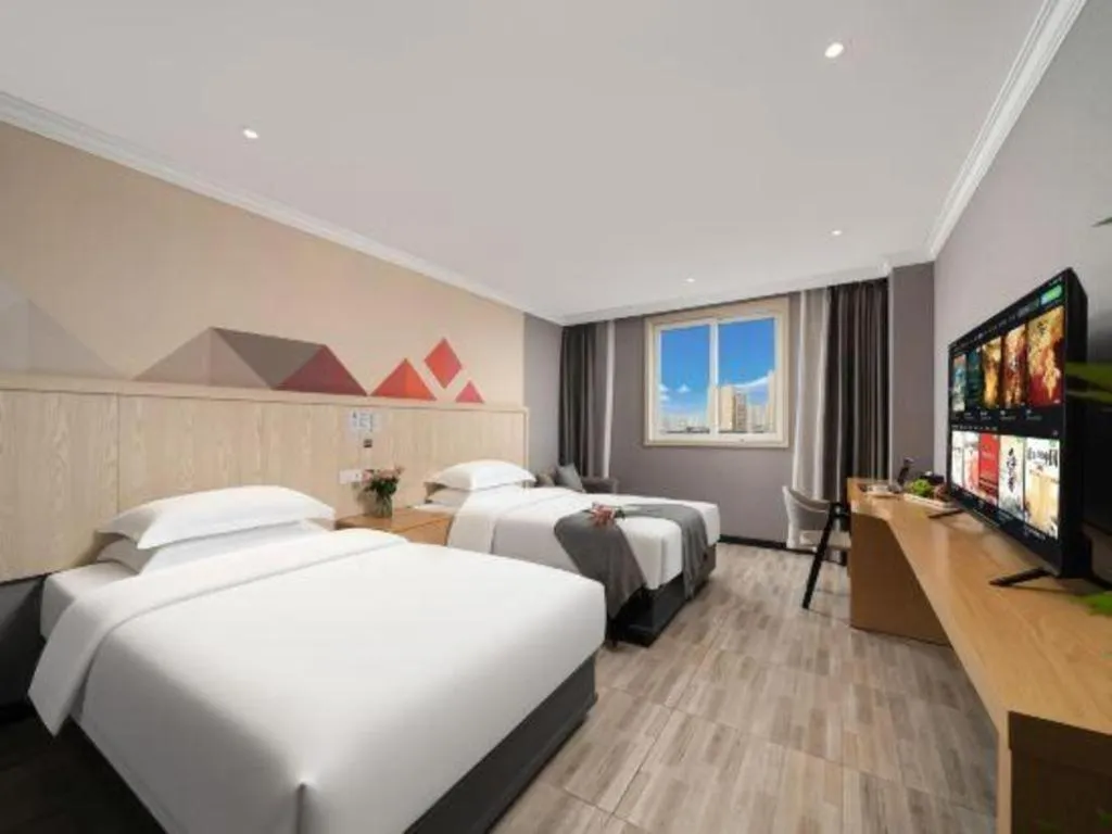 Bed in Borrman Hotel Chongqing Hechuan High-speed Railway Station District Government