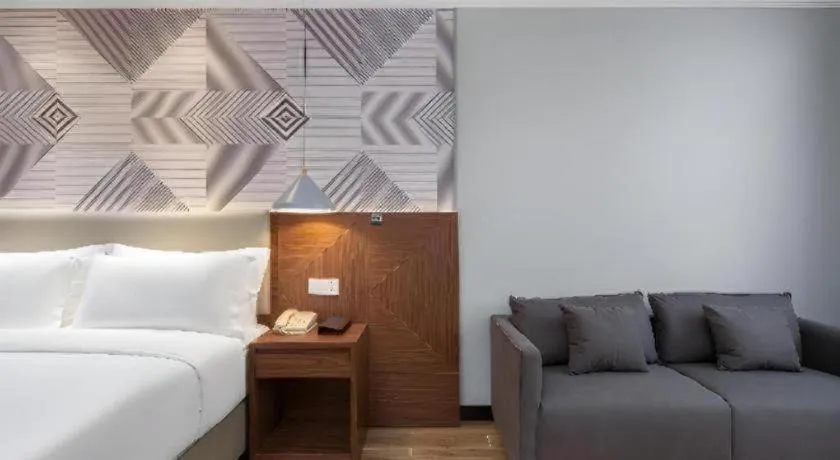 Bed in Borrman Hotel Chongqing Hechuan High-speed Railway Station District Government