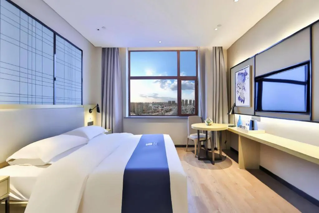 Bed in Echarm Hotel Hengshui 2nd High School High-speed Railway Station